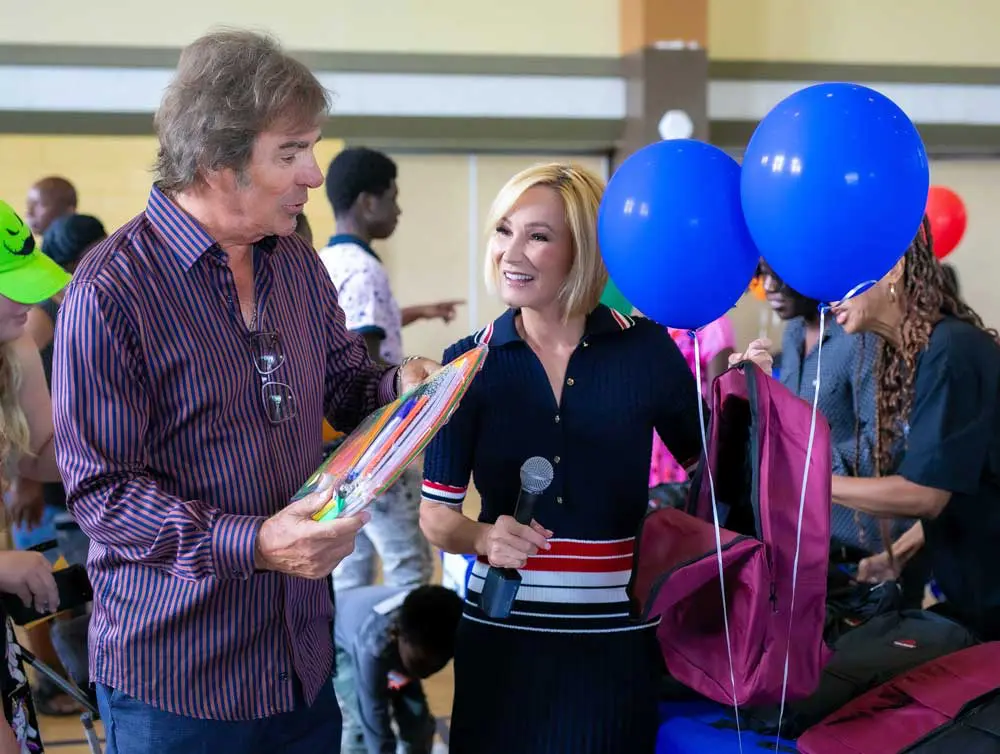 Paula White-Cain and Jonathan Cain at Back to School Bash Outreach Event