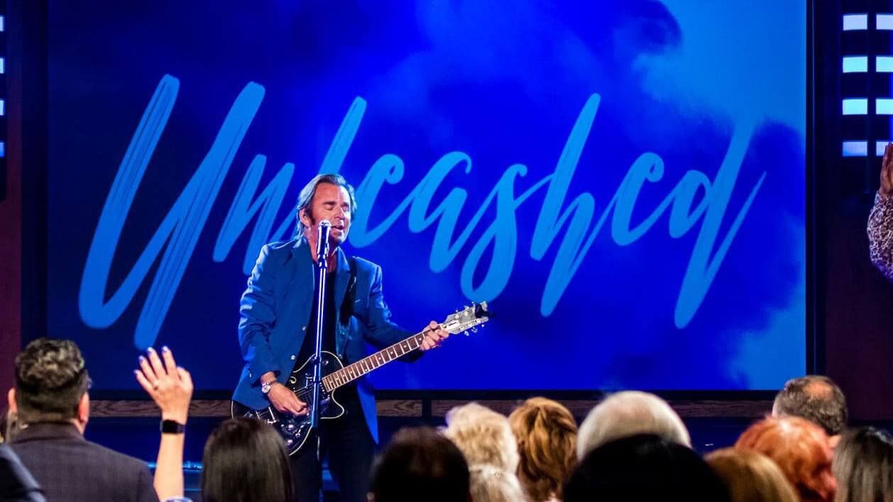 Jonathan Cain performing at Unleashed 2019 event by Paula White Ministries